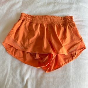 Orange lululemon hotty hot shorts